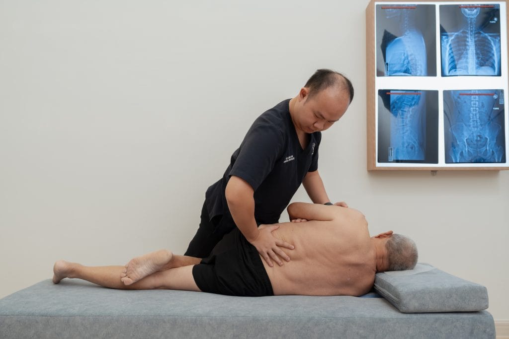 Rong Han is doing a Pelvic Push adjustment on pelvic bench in Johor Bahru