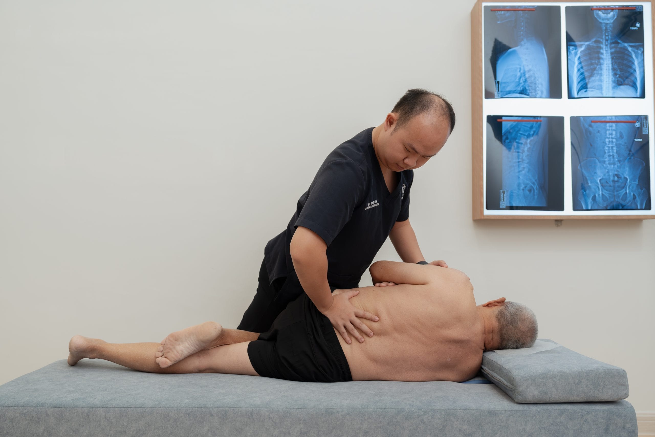 Rong Han is doing a Pelvic Push adjustment on pelvic bench in Johor Bahru