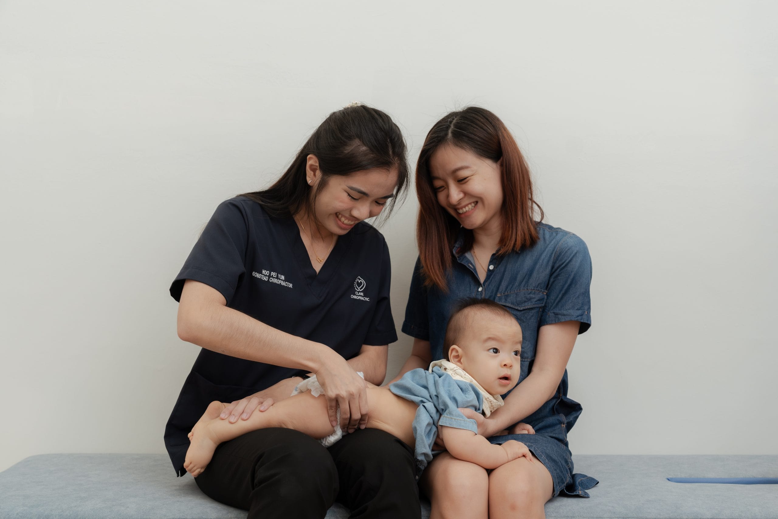 Pei Yun checking pelvic movement on baby