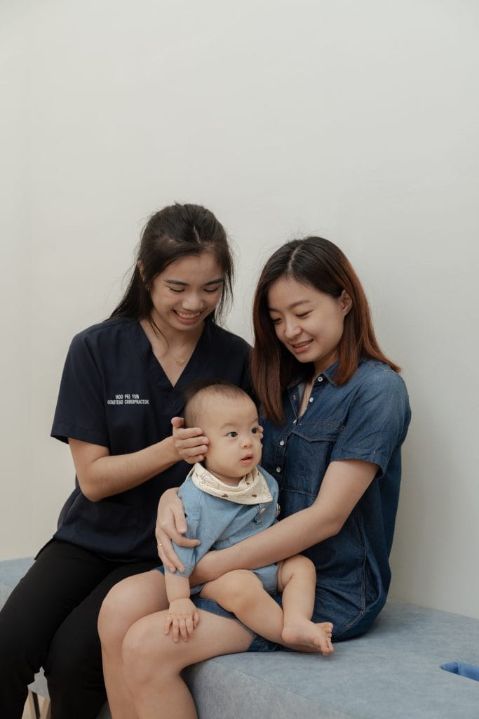 Pediatric Chiropractor doing visual analysis on kids