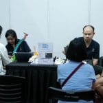 yeo and pei yun doing spinal screening in wellbeing day