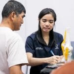 Pei Yun is taking note about patient history