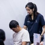 Pei Yun is helping patient to check his shoulder range of motion