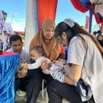 Pei yun checking for baby sacrum and pelvic alignment in spinal screening